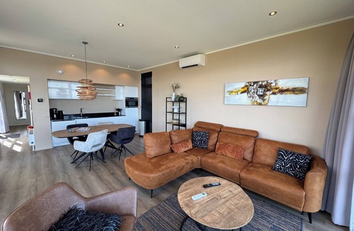 Enkhuizen House | Beachfront Chalet in First Row with Exceptional Sea View and Fenced Garden