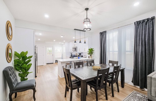 Northside House | Charming private home sleeps 6 in the Heights near Downtown with fast WiFi, smart TVs, ample parking, and a primary king ensuite for added privacy and comfort.