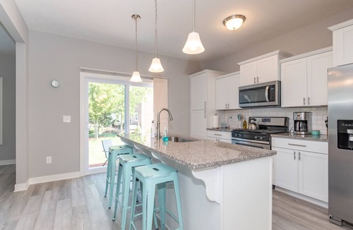 South Haven House | Fun Haven sleeps 12. All season pool and hot tub. Walk to beach. Pet friendly.