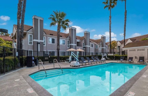 Downtown Village House | Get Ready for the Perfect Vacation Escape! THREE 2BR Suite w/ Full Kitchen, Pool