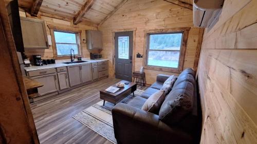 Superior Cabin | Micham's Clark Fork River Retreat - River Front, Mountain View, Fire Pit - Cabin 1