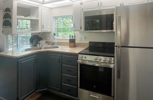 Park Falls House | River's Edge Tiny Home | Expansive Deck