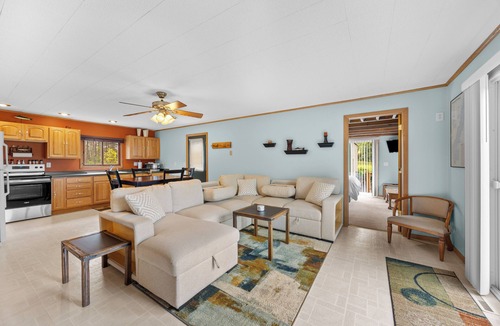 Nekoosa Cottage | Scenic riverfront cottage with boat landing and docks.