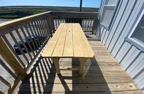 Golden Meadow House | Waterfront Fun -Coastal Realty Group Near Elmers Island