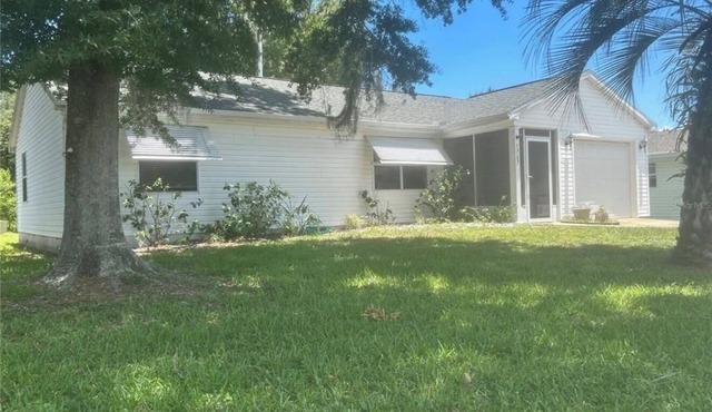 Cozy 2 bedroom house in the historic side of the villages! golf cart included!