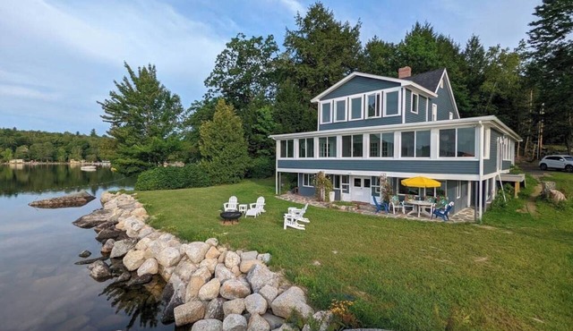 Light-filled lakefront home for up to 15 with private beach and dock near Acadia