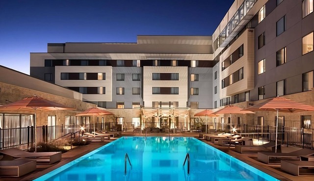 Stylish Pool View King | Free Parking, Near Shops, Parking Steps Away!
